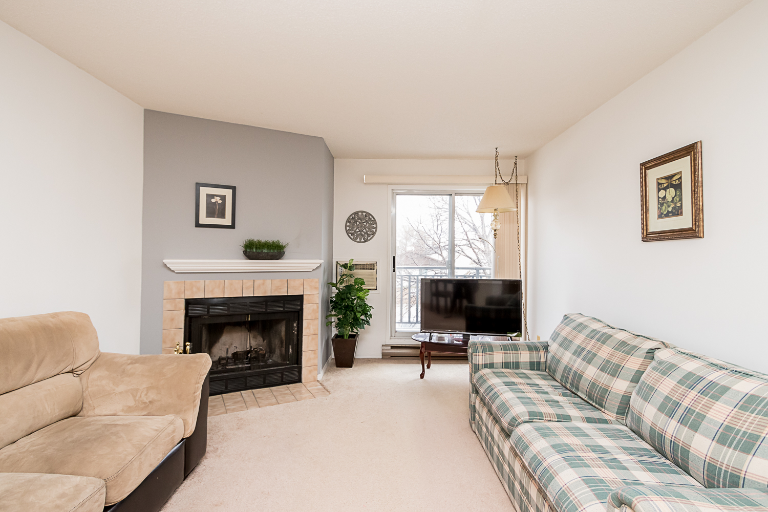 203-1671 Plessis Road - Living Room